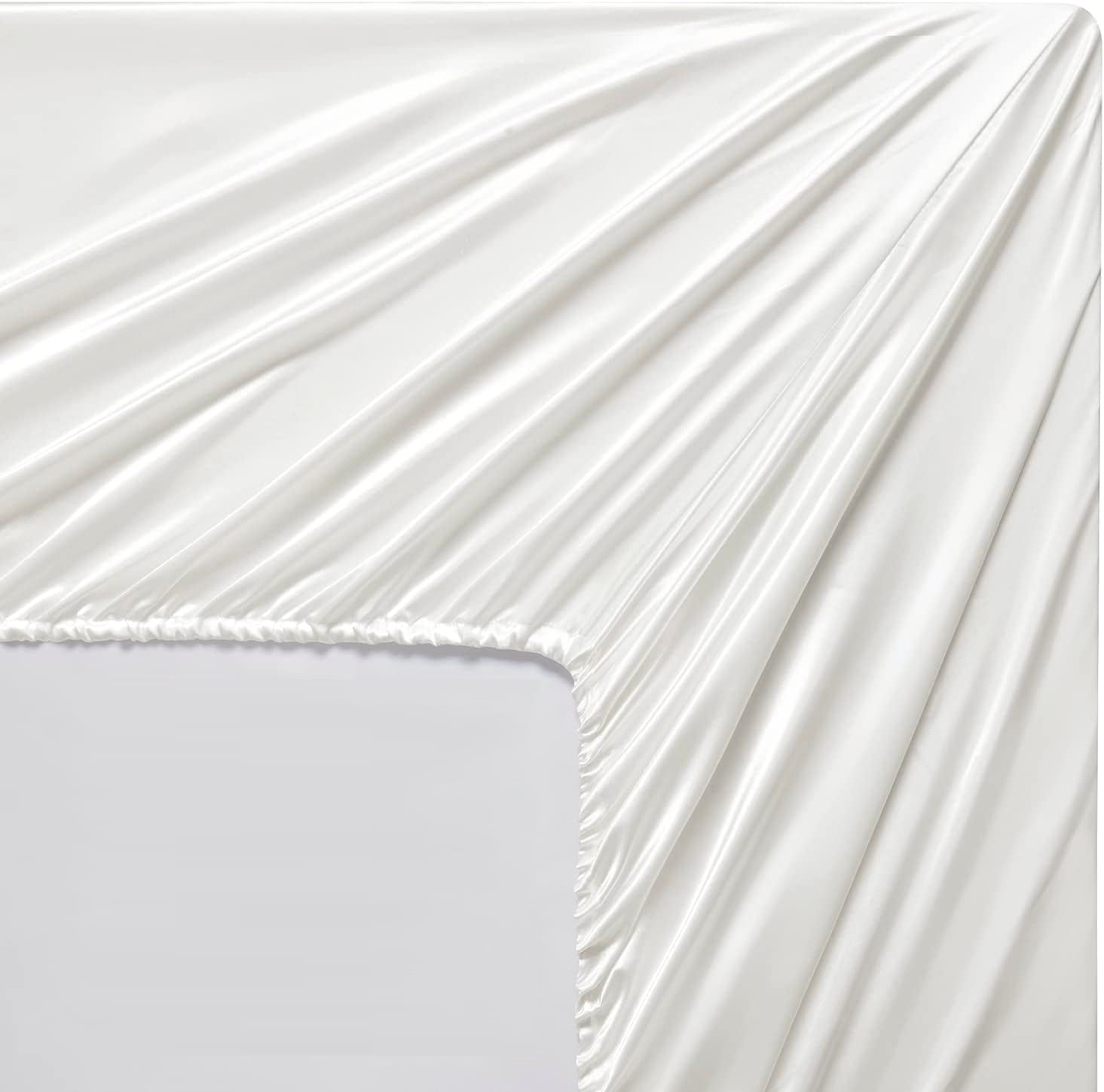 Satin fitted sheet in white on mattress