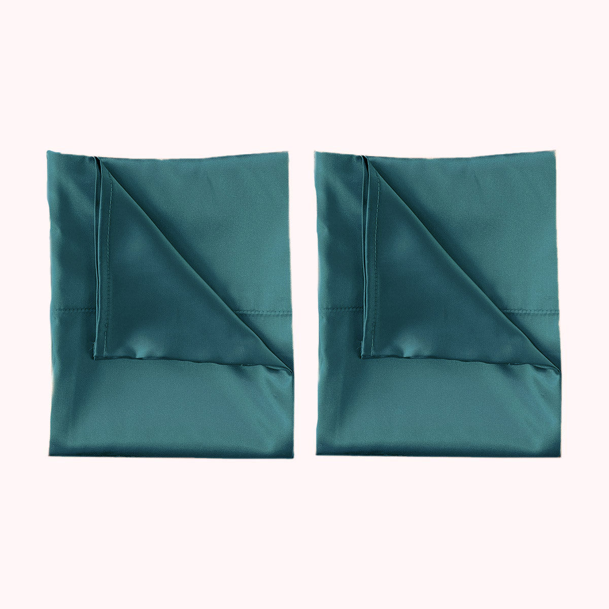 2 folded satin pillowcases in teal